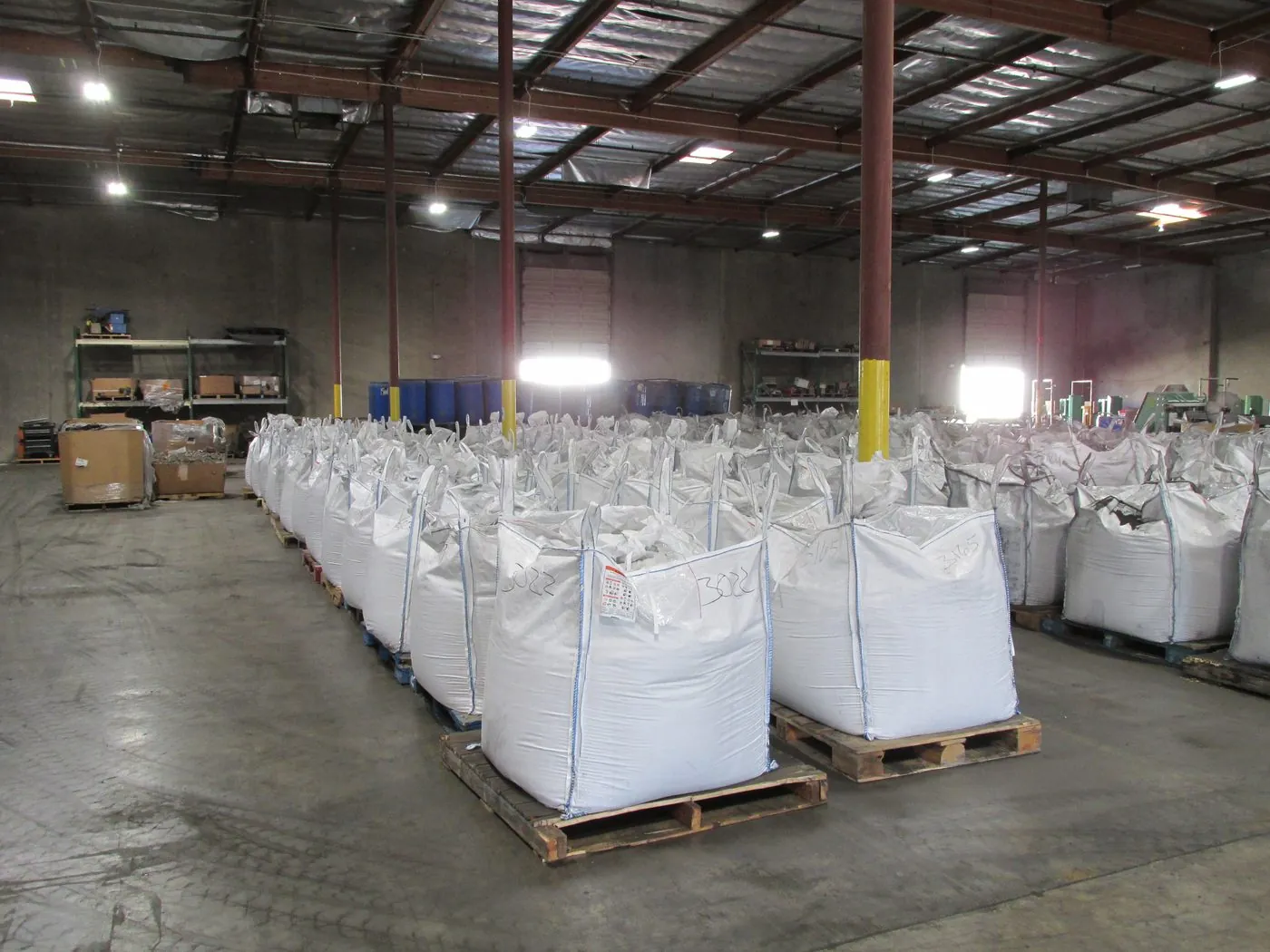 Separation stage dividing the shredded stream into labelled collection bins